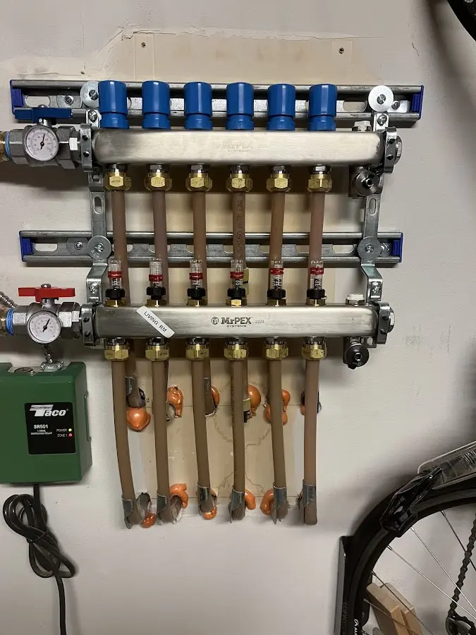 Plumber performing Gas Line Installation at a residential property in Excelsior Springs